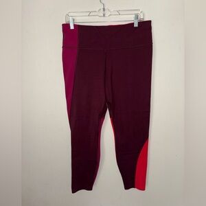 Athleta ASYM Colorblock Tight Size LP with zipper pocket on the back